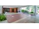 Welcoming entrance area with brick flooring, bench seating, and verdant potted plants at 375 Ralph Mcgill Ne Blvd # 1701, Atlanta, GA 30312