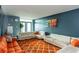 Bright living room featuring stylish white sofas, colorful artwork and an orange patterned rug at 375 Ralph Mcgill Ne Blvd # 1701, Atlanta, GA 30312