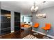 Open-concept living space with a modern chandelier, bright furniture, and chic accents at 375 Ralph Mcgill Ne Blvd # 1701, Atlanta, GA 30312