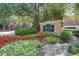 Elegant sign for City Heights Condominiums with manicured landscaping in front at 375 Ralph Mcgill Ne Blvd # 1701, Atlanta, GA 30312