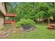 Spacious green backyard with an exterior two-story deck, perfect for outdoor entertaining at 497 Fire Fly Dr, Tucker, GA 30084