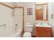 Classic bathroom showcasing tub/shower combo and traditional vanity at 497 Fire Fly Dr, Tucker, GA 30084
