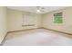 Bedroom with carpet, windows, and natural light; ready for personal touches at 497 Fire Fly Dr, Tucker, GA 30084