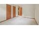 Spacious bedroom featuring carpet, multiple closets, and natural light at 497 Fire Fly Dr, Tucker, GA 30084