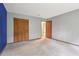 Spacious bedroom with an adjacent door and wide closet at 497 Fire Fly Dr, Tucker, GA 30084