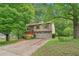 Charming two-story home with a two-car garage and well-maintained front yard at 497 Fire Fly Dr, Tucker, GA 30084