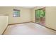 A bright living room with a sliding glass door and outdoor views at 497 Fire Fly Dr, Tucker, GA 30084