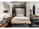 Contemporary bedroom featuring a space-saving Murphy bed, unique artwork, and modern accents for a stylish urban living at 878 Peachtree St # 601, Atlanta, GA 30309