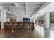 Inviting common area with modern decor, bar seating, and large windows with outdoor views at 878 Peachtree St # 601, Atlanta, GA 30309