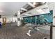 Well equipped resident gym area with several cardio machines, weights, and workout equipment at 878 Peachtree St # 601, Atlanta, GA 30309