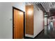 Hallway with modern lighting, unit number 601, and neutral walls, creating a clean and inviting atmosphere at 878 Peachtree St # 601, Atlanta, GA 30309