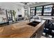 Spacious kitchen island with a sink, open layout, with an integrated living room and dining area at 878 Peachtree St # 601, Atlanta, GA 30309