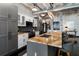 Well-appointed kitchen featuring custom cabinets, granite countertops, and stainless steel appliances at 878 Peachtree St # 601, Atlanta, GA 30309