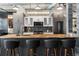 Modern kitchen with stainless steel appliances, a unique countertop, and pendant lighting above the island at 878 Peachtree St # 601, Atlanta, GA 30309