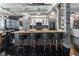 Open concept kitchen with a large island, granite countertops, and a sleek, modern design at 878 Peachtree St # 601, Atlanta, GA 30309