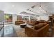 Large resident lounge area featuring comfortable leather couches, a rug, and light filled windows at 878 Peachtree St # 601, Atlanta, GA 30309