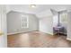 Bedroom with natural light, wood floors, and grey walls at 1645 Four Notch Rd, Carrollton, GA 30116