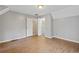Bedroom featuring wood floors and neutral walls at 1645 Four Notch Rd, Carrollton, GA 30116