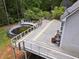 Elevated deck overlooking the backyard features an above-ground pool at 1645 Four Notch Rd, Carrollton, GA 30116