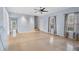 Spacious living room features natural light from large windows and hardwood flooring at 1645 Four Notch Rd, Carrollton, GA 30116