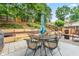 This backyard has a patio with outdoor dining and a hammock at 2865 Winter Rose Ct, Dunwoody, GA 30360