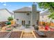 Lovely backyard with a patio, outdoor seating, a well-maintained lawn, and garden beds at 2865 Winter Rose Ct, Dunwoody, GA 30360