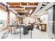 Basement workshop with table saw and overhead ventilation to keep the space clean at 4090 Cooks Farm Nw Dr, Kennesaw, GA 30152