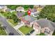 Aerial view of a two-story home featuring brick accents, bay windows, and a well-maintained lawn at 4125 Fallbrook Dr, Duluth, GA 30096