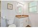 Bathroom featuring a granite vanity, a round mirror, tiled floors, and a toilet with modern fixtures at 4125 Fallbrook Dr, Duluth, GA 30096