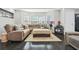 Inviting living room with a comfortable sectional sofa, plush rug, and elegant decor at 4125 Fallbrook Dr, Duluth, GA 30096