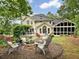 Picturesque backyard with a fire pit and outdoor chairs, perfect for entertaining at 5625 Brookstone Nw Dr, Acworth, GA 30101