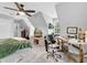 Large bedroom with a ceiling fan, a fish tank, and unique ceiling architecture at 5625 Brookstone Nw Dr, Acworth, GA 30101