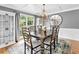 Elegant dining room with stylish lighting, and neutral color scheme for formal gatherings at 5625 Brookstone Nw Dr, Acworth, GA 30101