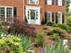 View of the home's entrance, showcasing the front door and landscaping, adding curb appeal at 5625 Brookstone Nw Dr, Acworth, GA 30101