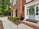 Charming front entrance with well-maintained landscaping, wreath and walkway at 5625 Brookstone Nw Dr, Acworth, GA 30101