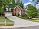 Stately brick home with manicured lawn and lovely curb appeal at 5625 Brookstone Nw Dr, Acworth, GA 30101