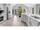 Bright kitchen with a large island, plenty of cabinets, and a view to the backyard at 5625 Brookstone Nw Dr, Acworth, GA 30101
