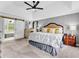 Spacious main bedroom with view to ensuite, tray ceiling, and ample natural light at 5625 Brookstone Nw Dr, Acworth, GA 30101