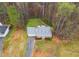 Aerial view of home showing roof, landscaping, and extended driveway at 118 Hunters Pl, Villa Rica, GA 30180