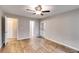 Spacious bedroom with hardwood floors, neutral walls, and a ceiling fan at 118 Hunters Pl, Villa Rica, GA 30180