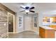 Bright, open kitchen with woodgrain wall decor, stainless steel appliances, and an island at 118 Hunters Pl, Villa Rica, GA 30180