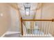 View down the stairs to a living room at 118 Hunters Pl, Villa Rica, GA 30180