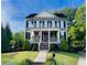 Charming two-story home with a welcoming front porch and second-story balcony at 1205 Renaissance Se Ct, Mableton, GA 30126