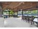 Spacious outdoor patio area with bar seating, perfect for relaxing and entertaining at 134 Johnston Farm Ln, Woodstock, GA 30188