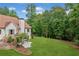 Exterior angle of back yard and back of house with deck and stone steps at 1825 Epperson Rd, Canton, GA 30115