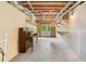 Basement features open ceiling, piano and french doors at 1825 Epperson Rd, Canton, GA 30115