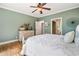 Another view of bedroom with ceiling fan and ensuite bath at 1825 Epperson Rd, Canton, GA 30115
