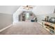 Spacious bonus room offers a versatile space for recreation and relaxation at 1825 Epperson Rd, Canton, GA 30115