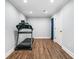 Exercise room with wood floor, a door and a treadmill at 1825 Epperson Rd, Canton, GA 30115