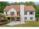 Exterior view of home with back deck, patio and large yard at 1825 Epperson Rd, Canton, GA 30115